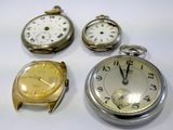 several different types of pocket watches are displayed on a white surface