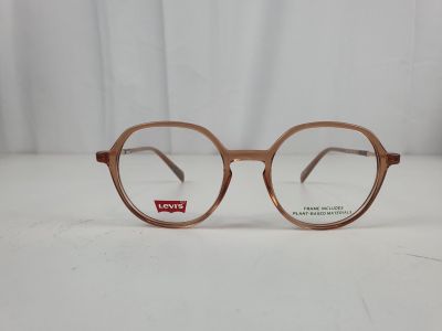 a close up of a pair of glasses on a table