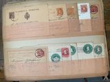 a book with stamps on it sitting on a table