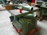 a machine that is sitting on a pallet in a warehouse