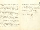 un vieux manuscrit sur lequel figure une lettre manuscrite