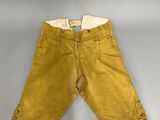 an image of a pair of yellow pants on a white surface