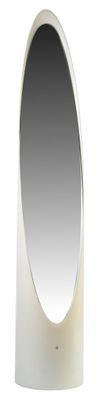 a white oval shaped mirror on a white wall