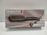 packaging of remington straight brush in a box on a white surface