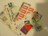 many different types of stamps on the table