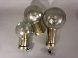 three light bulbs that are sitting on a table