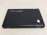 the back of a laptop with the battery removed on a white surface