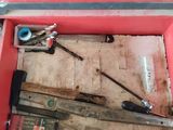 a red box with tools in it on the floor