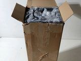 a cardboard box that has a bunch of hair in it