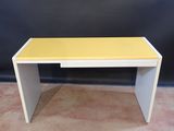 a white and yellow desk with a yellow top