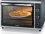 an image of a pizza sitting in a toaster oven