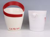 two white and red buckets sitting next to each other on a table