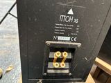 a close up of a black box with some screws on it