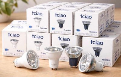 many different types of light bulbs sitting on a table