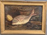 un tableau représentant un poisson et un morceau de pain posés sur une table