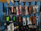a rack with many different items on it in a room