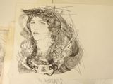 drawing of a woman ' s face on a piece of paper