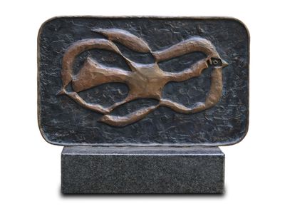 a bronze sculpture of a snake on a marble base