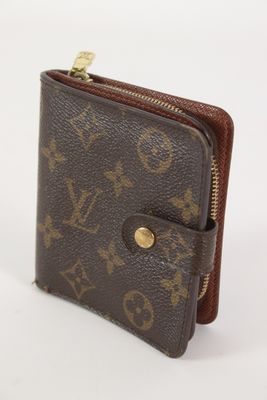 Portefeuille en cuir Louis Vuitton Monogramme avec finitions dorées