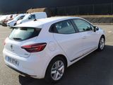 a white car that is parked in a parking lot