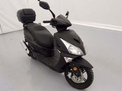 a black scooter parked in a white room