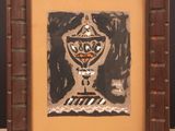 painting of a vase in a frame on a table