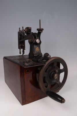 an old sewing machine that is sitting on a table