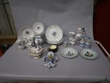 a table that has a lot of china on it