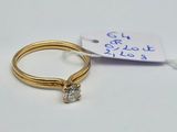 an image of a gold ring with a diamond on top of it