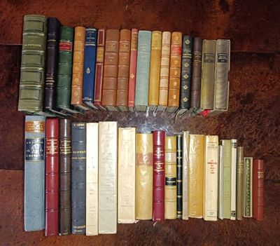 a lot of books that are sitting on a table