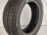 a close up of a tire on a white surface