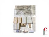 a pile of old books on a white surface
