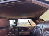 an image of the inside of a car with leather seats