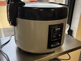 a rice cooker sitting on top of a counter