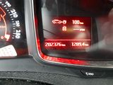 a close up of a car ' s dashboard with a speedometer