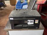 a printer that is sitting on top of a table