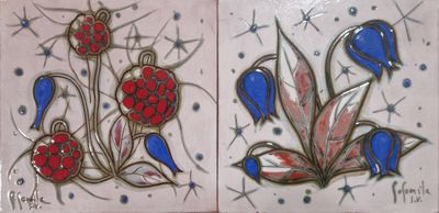 deux dessins de fleurs peints sur un carreau
