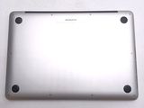 a close up of a silver laptop computer on a table