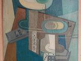 une photo d'un tableau sur le mur d'une salle de bain