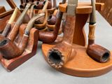 a lot of pipe holders that are on a table