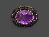 une broche en améthorate et diamants