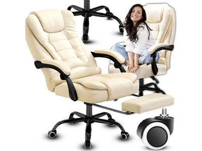 a woman that is sitting in a chair with a remote control