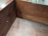 a close up of a wooden box on a table