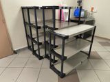 a shelf with several shelves on it in a room