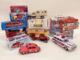 many different types of toy cars and trucks on the table