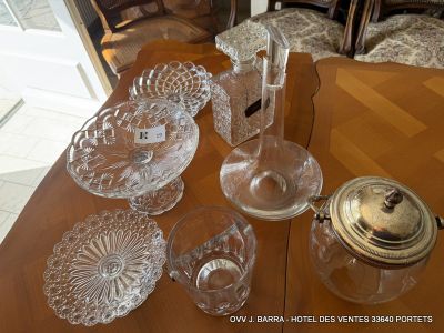 a table with a lot of glass items on it