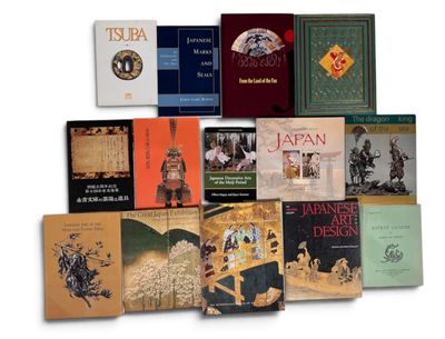 a lot of books that are sitting on a table