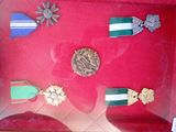 a display case with medals and medals in it