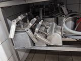 an image of a kitchen with a bunch of clutter on the counter