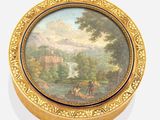 an image of a round box with a painting of a landscape on it